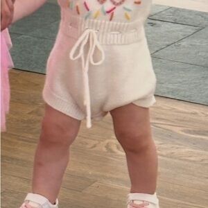 One Year White Knit Baby Romper with Drawstring